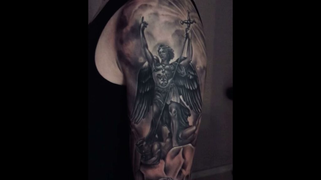 tattoo st michael statue mexico city