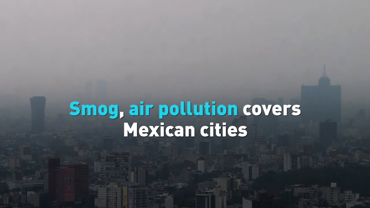 which geographic feature traps air pollution over mexico city